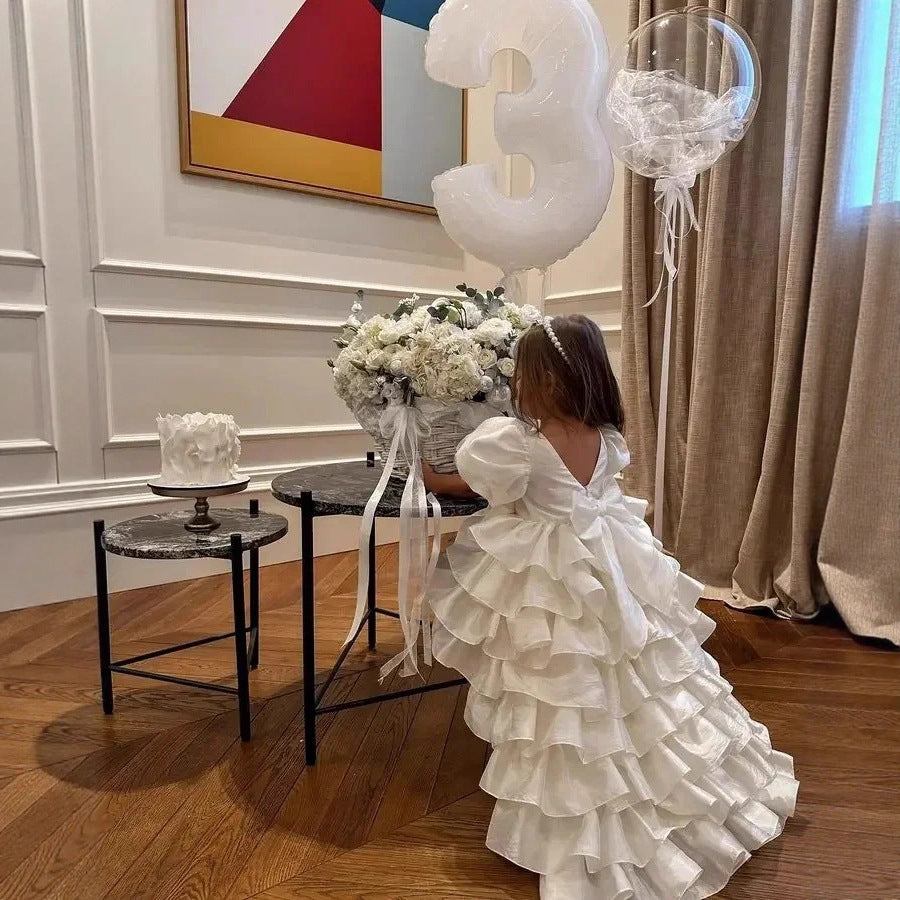 Girl's Birthday Banquet Princess Dress Children's Tail worn by a little girl celebrating her 3rd birthday party.