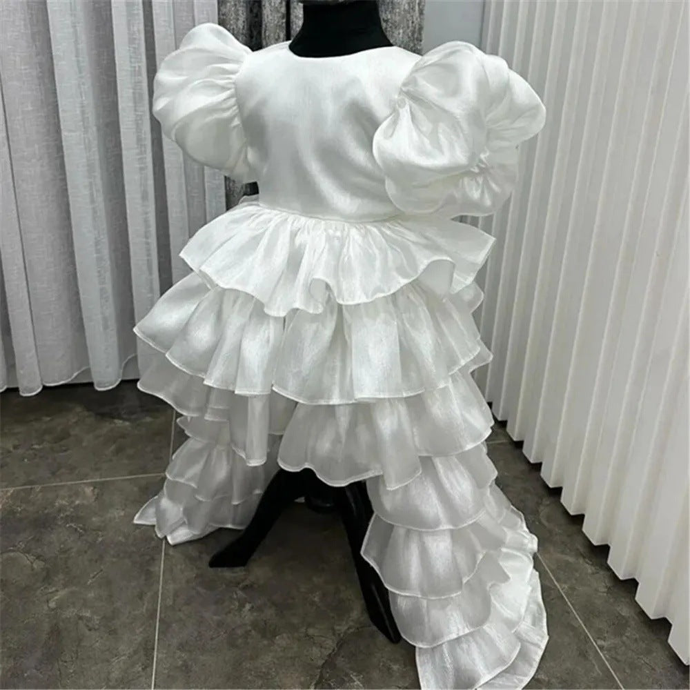 Girl's Birthday Banquet Princess Dress Children's Tail in white with ruffles and puff sleeves displayed on a mannequin.