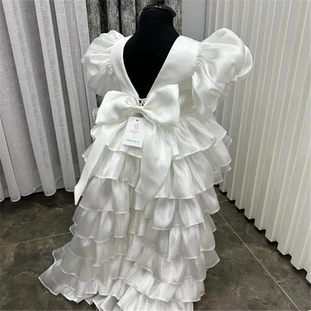 Girl's Birthday Banquet Princess Dress Children's Tail in white with ruffled layers and a bow at the back